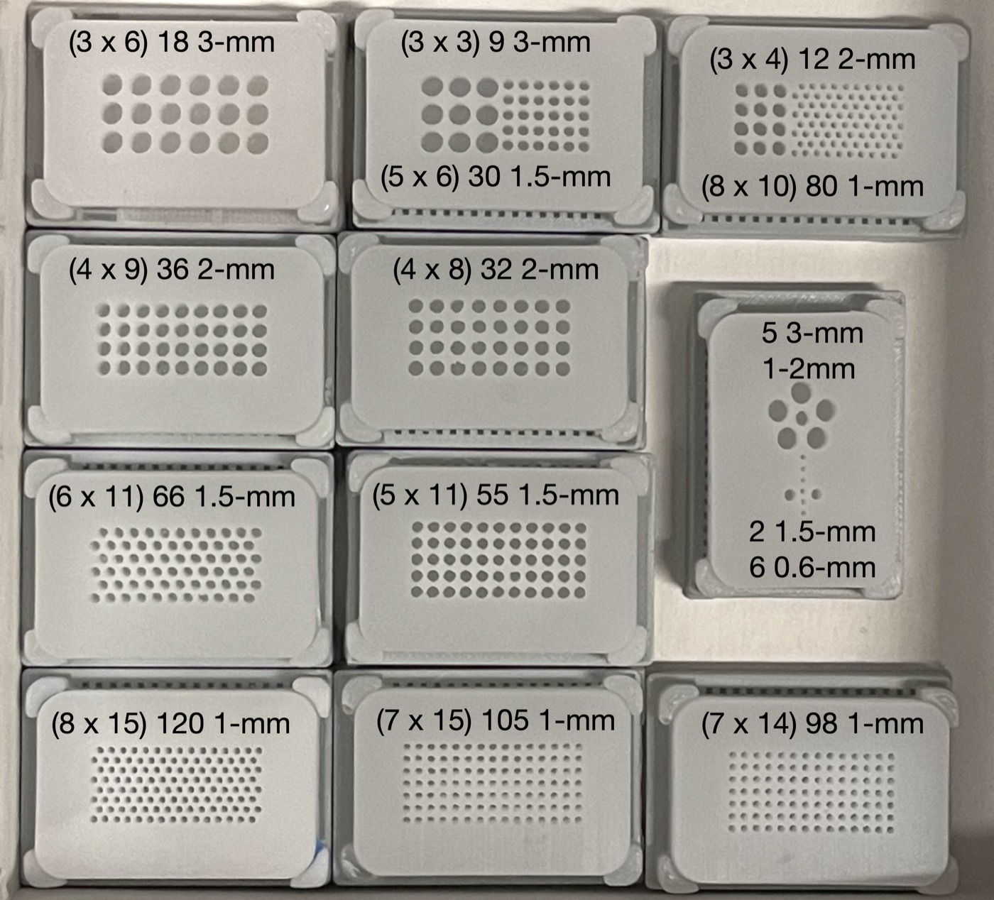 Labeled compact TMA recipient block prototypes showing multiple core sizes and layout options.