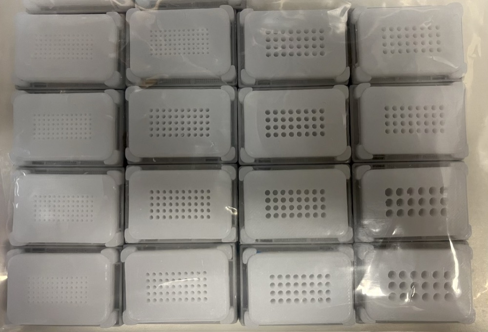 Mold-casted compact TMA recipient blocks arranged in trays.